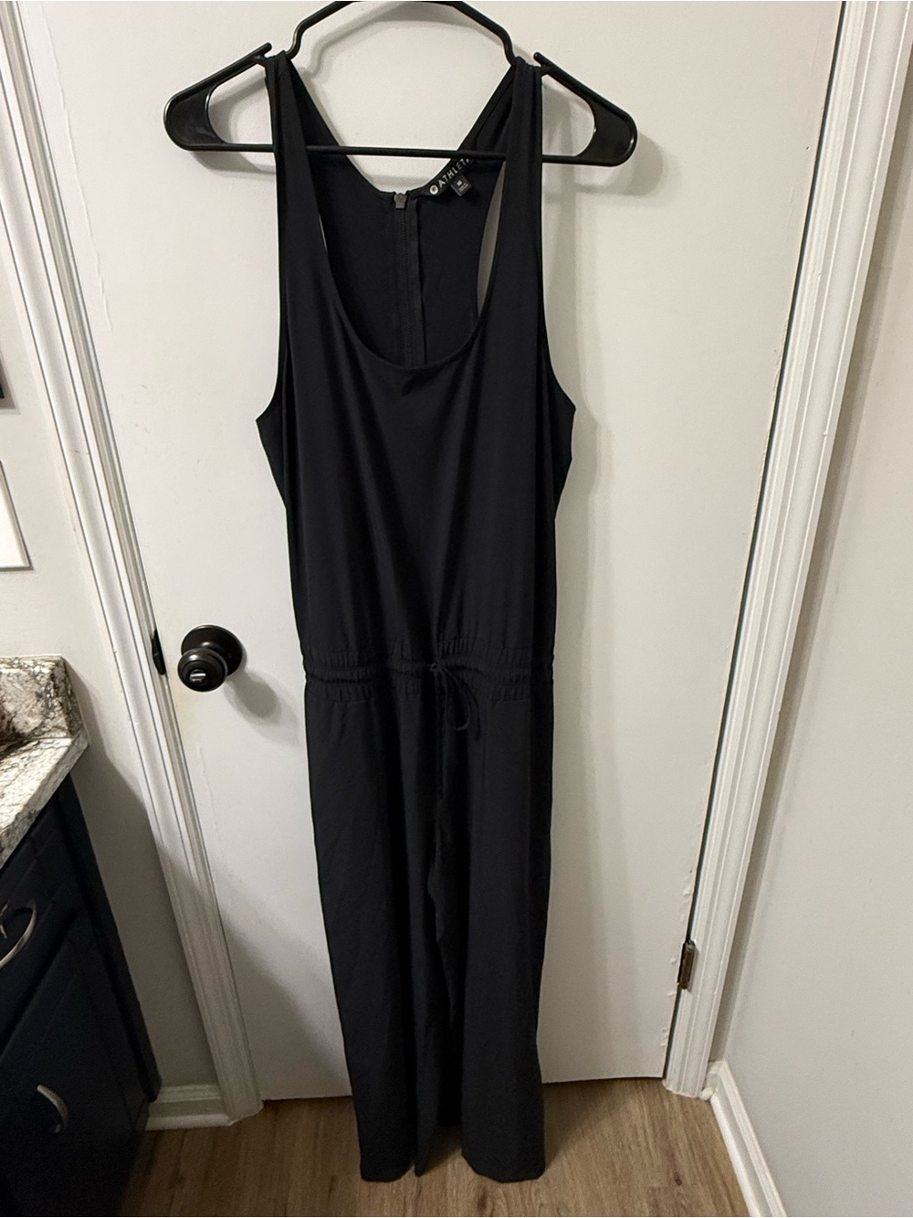 Athleta Black Sleeveless Jumpsuit with Drawstring Waist and Zipper Back